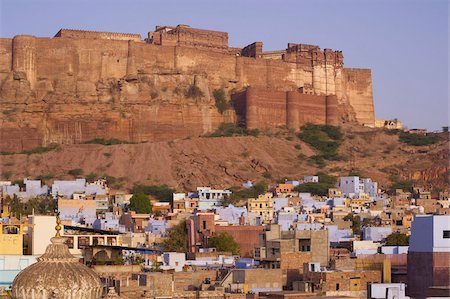 The Mehrangarh Fort on a hilltop overlooking the blue houses of Jodhpur, Rajasthan, India, Asia Stock Photo - Rights-Managed, Code: 841-03672224