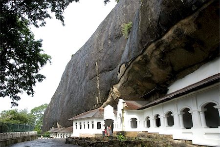 Exterior of Royal Rock Cave Temples, in natural caves in granite, Dambulla, Sri Lanka, Asia Stock Photo - Rights-Managed, Code: 841-03672332