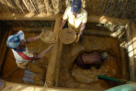 Hand-dug pit to extract sapphires and other gemstones, Ratnapura, southern Sri Lanka, Asia Stock Photo - Rights-Managed, Code: 841-03672369