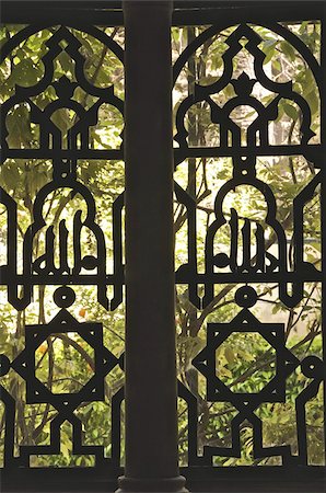 decorative iron - Wrought iron opening on to the gardens of Reales Alcazares (Alcazar Palace Gardens), Seville, Andalusia, Spain, Europe Stock Photo - Rights-Managed, Code: 841-03672610