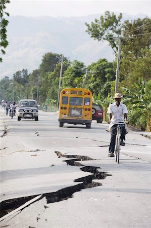 Earthquake fissures on road between Port au Prince and Leogane, earthquake epicenter, January 2010, Leogane, Haiti, West Indies, Caribbean, Central America Stock Photo - Rights-Managed, Code: 841-03672765