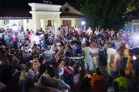 People watching live music on the steps at Casa de la Musica, Trinidad, UNESCO World Heritage Site, Cuba, West Indies, Caribbean, Central America Stock Photo - Rights-Managed, Code: 841-03672974