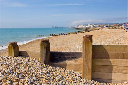 pebble - Pebble beach and groynes, Eastbourne Pier in the distance, Eastbourne, East Sussex, England, United Kingdom, Europe Stock Photo - Rights-Managed, Code: 841-03868210