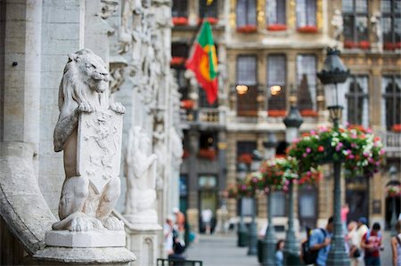 Lion statue on the Hotel de Ville (Town Hall) in the Grand Place, UNESCO World Heritage Site, Brussels, Belgium, Europe Stock Photo - Rights-Managed, Code: 841-03868385