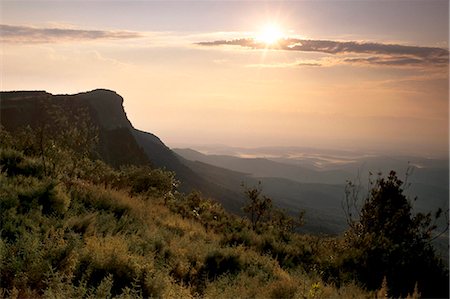 eastern transvaal - Sunrise over escarpment cliffs near God's Window, near Graskop, along Blyde River Canyon, Mpumalanga, South Africa, Africa Stock Photo - Rights-Managed, Code: 841-03869402