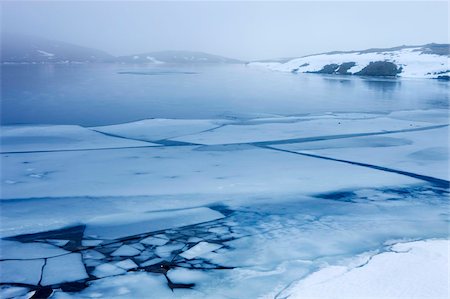 Ice and snow covering Llyn Y Fan Fawr in the Black Mountain in winter, Brecon Beacons National Park, Wales, United Kingdom, Europe Stock Photo - Rights-Managed, Code: 841-03869958