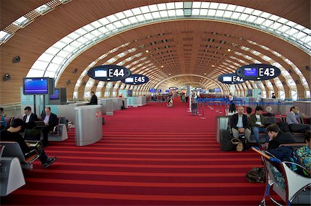 Businessmen and travellers in Terminal 2E, Charles de Gaulle international airport, Roissy, Paris, France, Europe Stock Photo - Rights-Managed, Code: 841-03871685