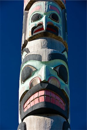 Tlinget Totem Pole at the Haines Public school, Southeast Alaska, Summer Stock Photo - Rights-Managed, Code: 854-05974264