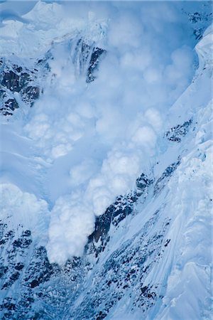 Billowing ice avalanche on the north side of Mount Hunter seen from Control Tower, Kahiltna Glacier, Alaska Range, Summer in Interior Alaska Stock Photo - Rights-Managed, Code: 854-05974569