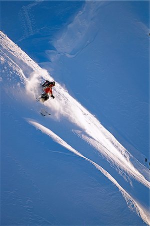 Extreme skier skis down steep snow covered mountain Chugach Mountains Southcentral Alaska Winter Stock Photo - Rights-Managed, Code: 854-02954875