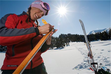 Woman prepares for backcountry skiing in Turnagain Pass of Southcentral Alaska during Winter Stock Photo - Rights-Managed, Code: 854-02954886