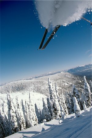 Downhill Skier Airborne Big Mtn Ski Resort Montana Winter Snow Stock Photo - Rights-Managed, Code: 854-02954893