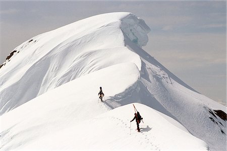 Climbers Nearing Summit of Mt Hawthorne Juneau SE AK winter scenic Stock Photo - Rights-Managed, Code: 854-02955043