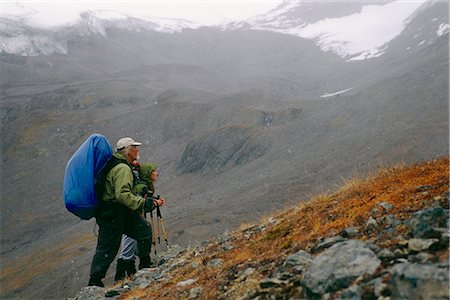 simsearch:854-02955238,k - Pair of backpackers approach the top of a pass at Wrangell St.Elias National Park in Southcentral. Stock Photo - Rights-Managed, Code: 854-02955228