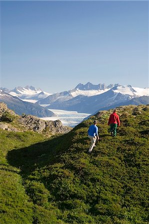 Couple hiking near Mendenhall Glacier Tongass National Forest Alaska Southeast Foto de stock - Con derechos protegidos, Código: 854-02955238