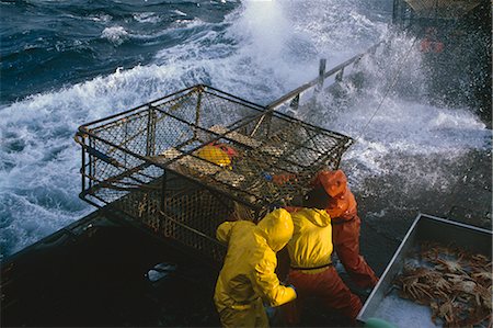 Fisherman Working on Deck Bad Weather Bering Sea AK /nOpilio Crab Season F/V Erla N Stock Photo - Rights-Managed, Code: 854-02955503