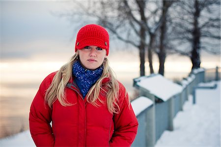 Young woman talks on cell phone at the Baycrest pullout on the sterling highway near Homer, Alaska during Winter Stock Photo - Rights-Managed, Code: 854-02955935