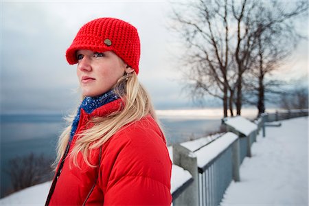 Young woman talks on cell phone at the Baycrest pullout on the sterling highway near Homer, Alaska during Winter Stock Photo - Rights-Managed, Code: 854-02955932
