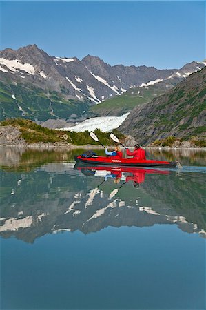 A Couple kayaking in Upper Shoup Bay, Shoup Glacier background, Shoup Bay State Marine Park, Prince William Sound, Alaska Stock Photo - Rights-Managed, Code: 854-03361790