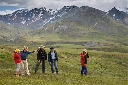 simsearch:854-03538162,k - A woman US National Park Interpretive Ranger leades group on a *discovery hike* on the tundra Eielson area Denali National Park Alaska Stock Photo - Rights-Managed, Code: 854-03538124