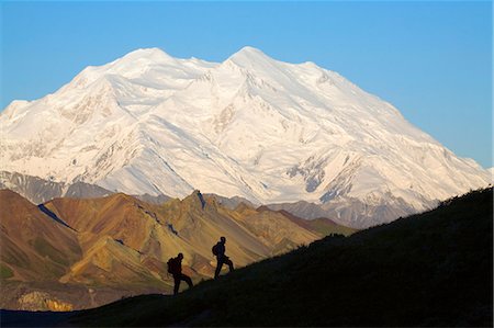 silhouette of man standing in a mountain top - Two hikers view McKinley at Grassy Pass near Eielson visitor center summer Denali National Park Alaska Stock Photo - Rights-Managed, Code: 854-03538137