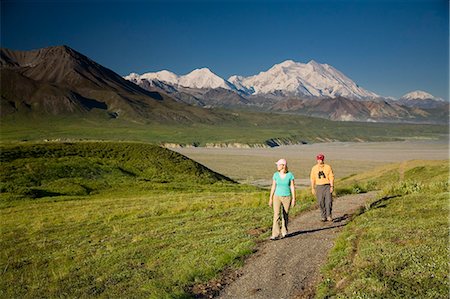simsearch:854-03538162,k - A young couple walk along a hard path near the Eielson visitor center with MtMcKinley in the background Denali NP Alaska Stock Photo - Rights-Managed, Code: 854-03538151
