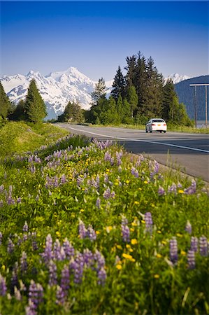 Vehicle travelling Seward Highway with Chugach Mountains and Mt. Carpathian in the background during Summer in Southcentral Alaska Stock Photo - Rights-Managed, Code: 854-03538751