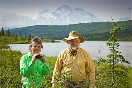 simsearch:854-03538162,k - Mature couple hike and enjoy scenery at Wonder Lake with Mt.Mckinley in background in  Denali National Park, Alaska during Summer Stock Photo - Rights-Managed, Code: 854-03539378