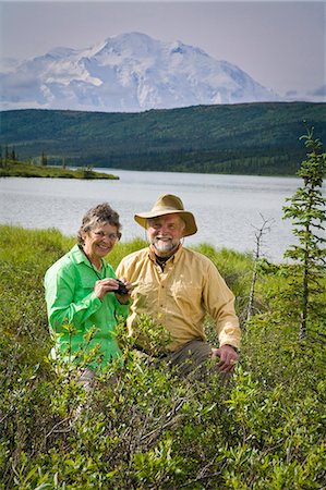 simsearch:854-03538162,k - Mature couple hike and enjoy scenery at Wonder Lake with Mt.Mckinley in background in  Denali National Park, Alaska during Summer Stock Photo - Rights-Managed, Code: 854-03539379