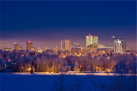 Skyline view of downtown Anchorage and Westchester Lagoon at twilight, Southcentral Alaska, Winter Stock Photo - Rights-Managed, Code: 854-03646386