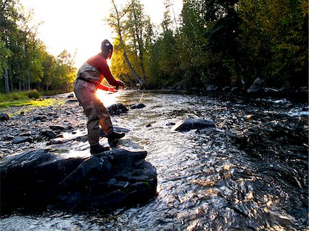 Woman fly fishing for Rainbow trout on the Russian River, Kenai Peninsula, Southcentral Alaska, Autumn Stock Photo - Rights-Managed, Code: 854-03739499