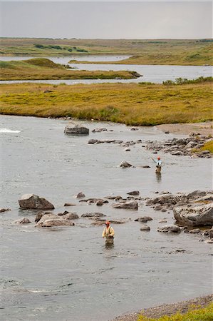 View overlooking anglers fly fishing in Bristol Bay near Crystal Creek Lodge, King Salmon, Southwest Alaska, Summer Stock Photo - Rights-Managed, Code: 854-03739719