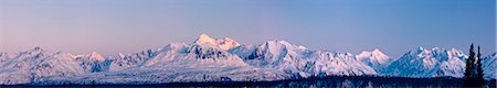simsearch:854-03846022,k - Panoramic view of the North and South summits of Mount McKinley and the Alaska Range with dawn alpenglow, as seen from the Denali State Park Viewpoint North  along the George Parks Highway, Denali State Park, Southcentral Alaska, Spring Stock Photo - Rights-Managed, Code: 854-03739943