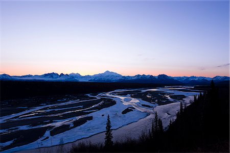 simsearch:400-04636750,k - Sunset glow over southside Mount McKinley and the Alaska Range with Chulitna River in the foreground, Denali State Park, Southcentral Alaska, Spring Stock Photo - Rights-Managed, Code: 854-03739966