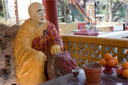 simsearch:855-06022225,k - A Buddhist monk statue at Tsing Shan temple, New Territories, Hong Kong Stock Photo - Rights-Managed, Code: 855-05984544