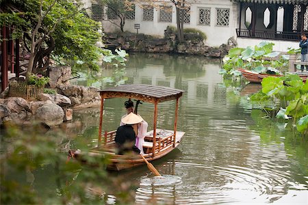 suzhou - A woman playing pipa on a boat at the garden to Liuyuan, Suzhou, Jiangsu Province, China Stock Photo - Rights-Managed, Code: 855-05982305