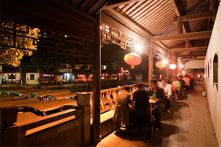 Local restaurant on the bridge, old town of Xitang at night, Zhejiang, China Stock Photo - Rights-Managed, Code: 855-05982800