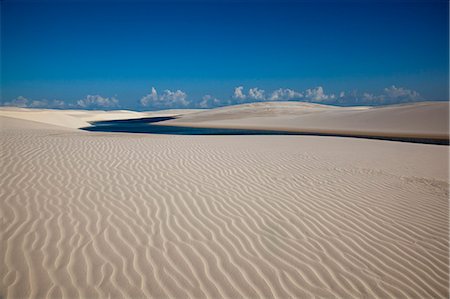 Sandy dunes near Lagoa Bonita (Beautiful Lagoon) at Parque Nacional dos Lencois Maranhenses, Brazil Stock Photo - Rights-Managed, Code: 855-06313092