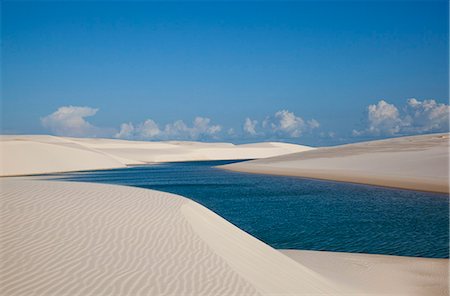 Sandy dunes near Lagoa Bonita (Beautiful Lagoon) at Parque Nacional dos Lencois Maranhenses, Brazil Stock Photo - Rights-Managed, Code: 855-06313093