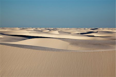 Sandy dunes near Lagoa Bonita (Beautiful Lagoon) at Parque Nacional dos Lencois Maranhenses, Brazil Stock Photo - Rights-Managed, Code: 855-06313117