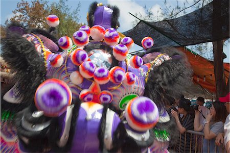 simsearch:855-06313347,k - Lion dance, part of the Bun festival procession performing at Cheung Chau, Hong Kong Stock Photo - Rights-Managed, Code: 855-06313260