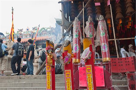 simsearch:855-06313356,k - Incense offerings at Pak Tai temple celebrating the Bun Festival, Cheung Chau, Hong Kong Stock Photo - Rights-Managed, Code: 855-06313350