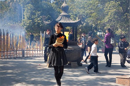 simsearch:855-06313357,k - Worshipper offering at Po Lin Monastery, Lantau Island, Hong Kong Stock Photo - Rights-Managed, Code: 855-06313581