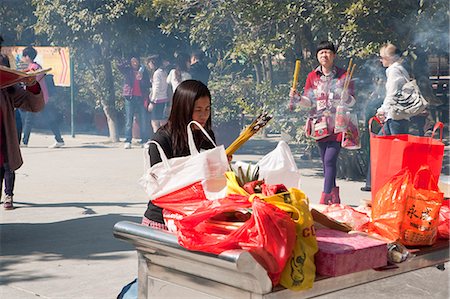 simsearch:855-06313356,k - Worshippers offering at Po Lin Monastery, Lantau Island, Hong Kong Stock Photo - Rights-Managed, Code: 855-06313709