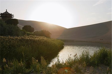 Sunset over Yueyaquan (Crescent moon lake), Mingsha Shan, Dunhuang, Silkroad, Gansu Province, China Stock Photo - Rights-Managed, Code: 855-06337763