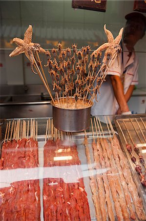 food stalls - Grilled scorpions selling at a food stall, Wangfujing snack street, Beijing, China Stock Photo - Rights-Managed, Code: 855-06338952