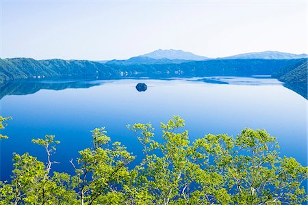 photos in hokkaido japan - Lake Mashu, highest lake of transparency, and Mount Shari, Akan national park, Teshikaga, Kawakami district, Hokkaido, Japan Stock Photo - Rights-Managed, Code: 855-08781606