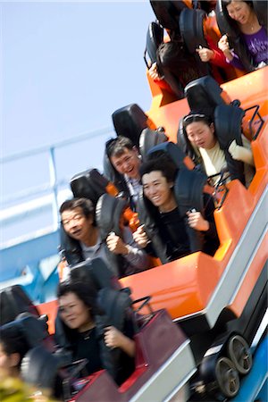 people riding roller coasters - The Dragon roller coaster,Ocean Park,Hong Kong Foto de stock - Con derechos protegidos, Código: 855-03024264