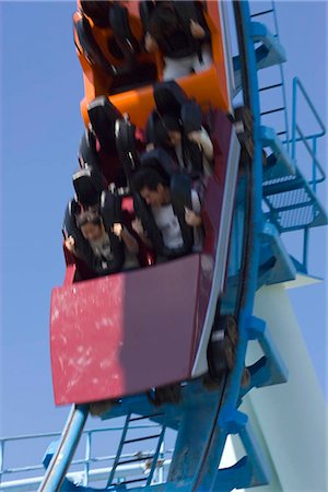 people riding roller coasters - The Dragon roller coaster,Ocean Park,Hong Kong Foto de stock - Con derechos protegidos, Código: 855-03024267