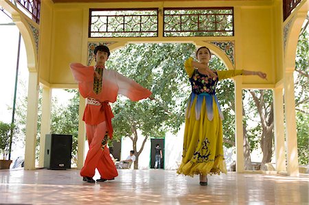 east asia - Uyghur dancers performing dance in Abakh Hoja Tomb,Kashgar,Xinjiang Uyghur autonomy district,Silkroad,China Stock Photo - Rights-Managed, Code: 855-03024611